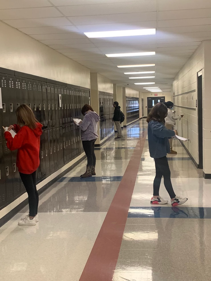 Students in hallway for gallery walk